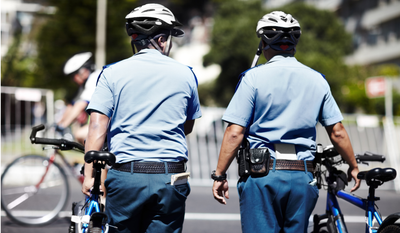 Over-the-top policing of bike helmet laws targets vulnerable riders