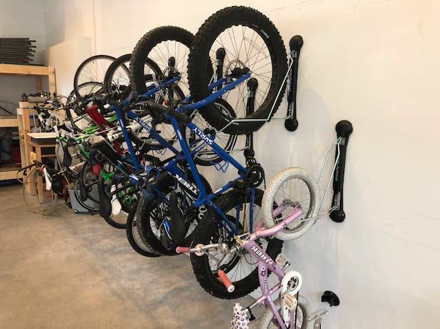 A photograph of a row of Steadyracks in a garage